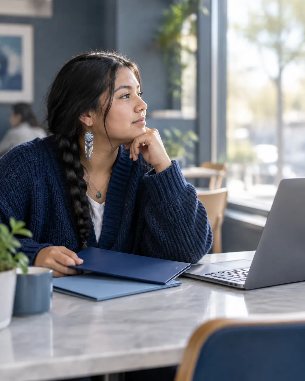 Young adult comparing education and career options
